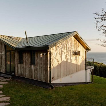 View of the house form the driveway when you first enter the plot