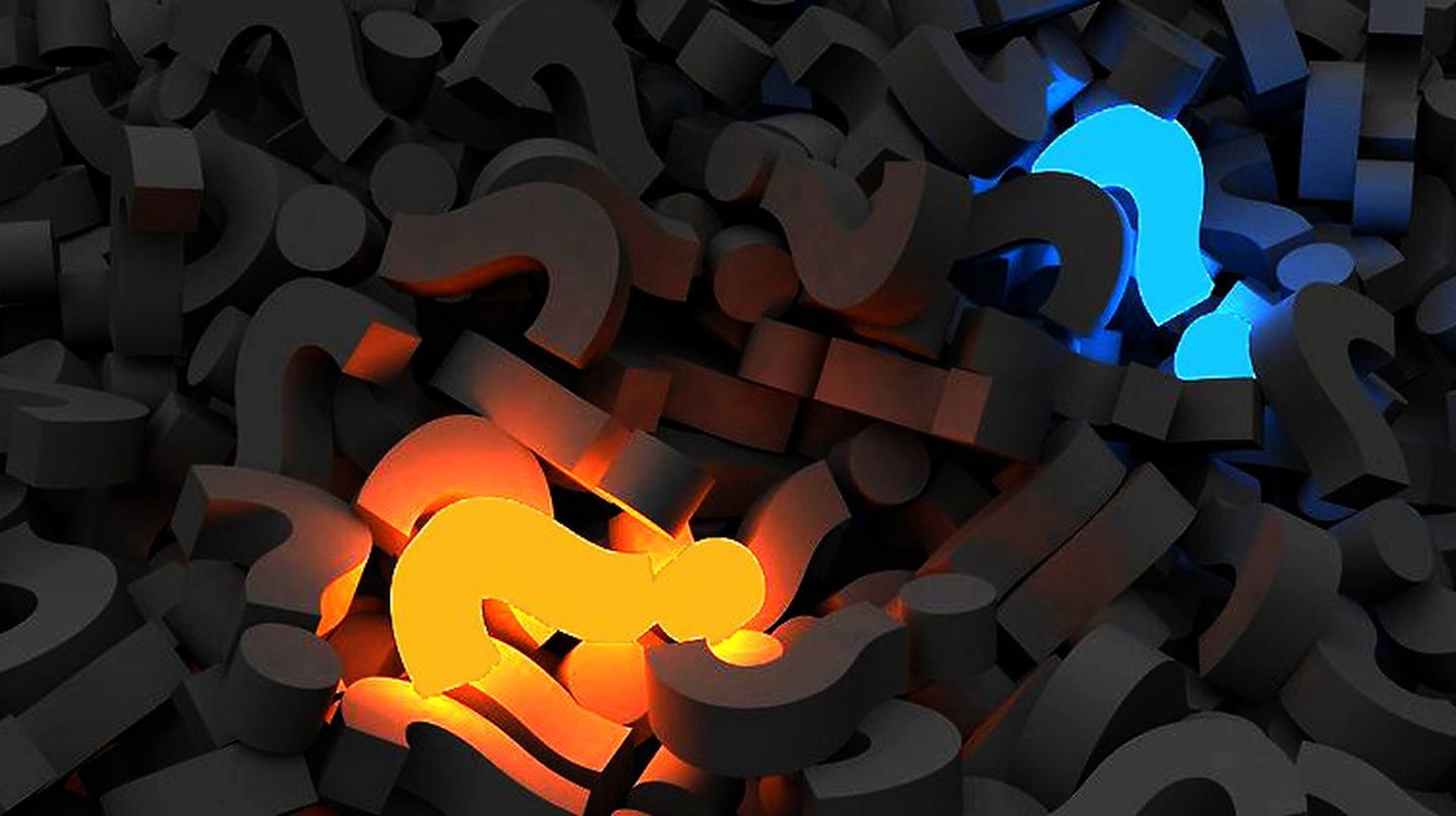 2 lit up question marks among darker ones