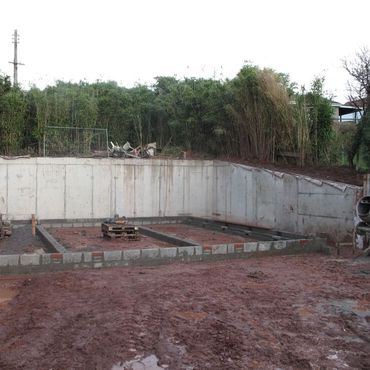 retaining walls going up ready for the wood framed house to arrive