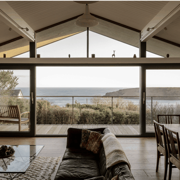 Breathtaking far reaching view from the open plan living room, over the balcony and out over Trewent headland to the Bristol Channel