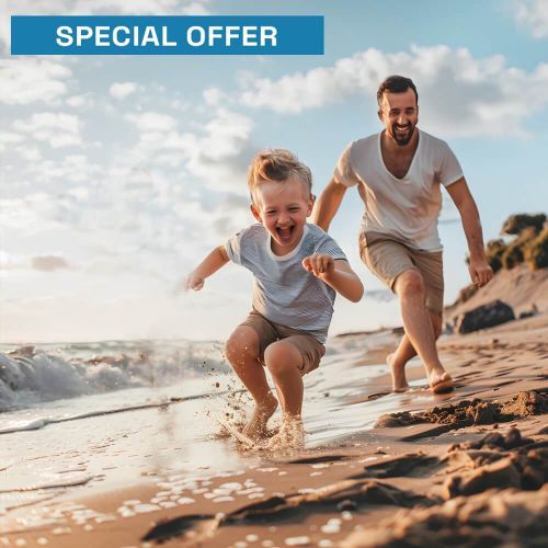 Father and son playing on the beach