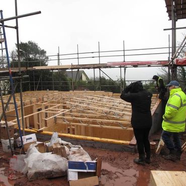 wood framed house which went up in 2 weeks in continual driving rain